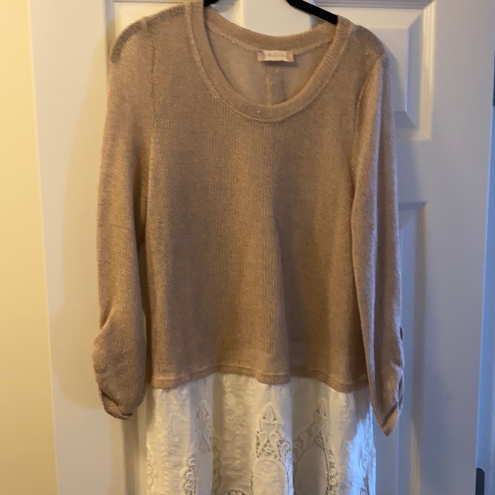 Adorable sweater with lace bottom and button back